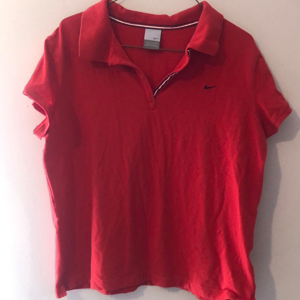 Women’s Nike Red Polo with a V neck size XXL